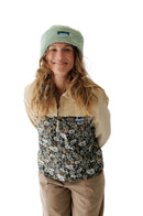 KAVU Fur Ball Beanie in de kleuren Moonless Night, Wax Paper en Soft Sage, verkrijgbaar bij Revert 95 Haarlem