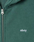 Obey Lowercase Pigment Zip Hood in Pigment Pine Needle, 100% cotton 16 oz extra heavyweight brushed back fleece zip hoodie met exposed front metal zipper rib waistband cuffs front patch pockets en Lowercase embroidery op borst in diepe gedempte groene Pine Needle kleur, verkrijgbaar bij Revert 95 Haarlem