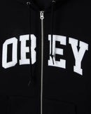 Obey Collegiate Zip Hood, 58% cotton 42% polyester heavyweight brushed fleece zip hoodie met exposed front metal zipper front patch pockets rib cuffs en hem tackle twill lettering op voorkant in relaxed fit verkrijgbaar in Ash Grey en Black, verkrijgbaar bij Revert 95 Haarlem