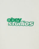 Obey Tonic Crew in Off White, heavy cotton fleece blend relaxed fit crewneck sweater met contrast cuffs en hem subtiel Obey graphic detail op de borst in warme romige off white kleur met beige ondertoon, verkrijgbaar bij Revert 95 Haarlem