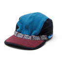 KAVU Fleece Strapcap in de kleuren Natural en Portside, verkrijgbaar bij Revert 95 Haarlem