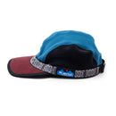 KAVU Fleece Strapcap in de kleuren Natural en Portside, verkrijgbaar bij Revert 95 Haarlem