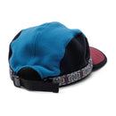 KAVU Fleece Strapcap in de kleuren Natural en Portside, verkrijgbaar bij Revert 95 Haarlem