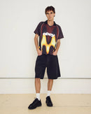 Obey Blurred Soccer Jersey Burnt Red Multi, sportief colorblock shirt van 100% polyester met rib V-hals kraag en Obey screen print, relaxed fit, maten S-XXL, verkrijgbaar bij Revert 95 Haarlem