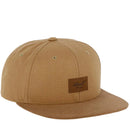 Reell Suede Cap, 80% cotton 20% suede 6-panel ball cap geïnspireerd op jaren 50 stijlen met flat suede rand aan klep kleur-geblokeerd design embossed Reell Script Logo Patch op voorkant en script logo flag snapback closure one size fits most, verkrijgbaar bij Revert 95 Haarlem