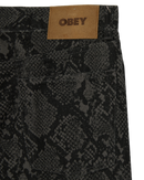 Obey Classic Baggy Denim Snake Print, denim jeans van 100% cotton met opvallend slangenprint, shank button closure en 5-pocket styling, relaxed fit straight leg, taillemaatjes 28-38, verkrijgbaar bij Revert 95 Haarlem