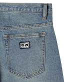 Obey Boxcar Straight Leg Denim in Heavy Vintage Indigo, 100% cotton 13.5 oz heavyweight denim relaxed fit straight leg jeans met 5-pocket design buttons en rivets met Obey lettering sewn-on eyes patch en deep blue vintage wash met fade-outs, verkrijgbaar bij Revert 95 Haarlem