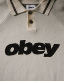 Obey Sport Polo Sweater Unbleached Multi, polosweater van 100% viscose met gestreepte rib polokraag, contrastpanelen en relaxed fit, maten S-XXL, verkrijgbaar bij Revert 95 Haarlem