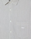 Obey Isaac Woven Shirt in Black Multi, 100% cotton poplin striped long sleeve shirt met button front closure chest pocket scallop hem en Obey embroidery op borst in gestreepte zwarte multi colorway relaxed fit Imported Fair Trade, verkrijgbaar bij Revert 95 Haarlem