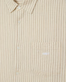 Obey Alan Woven Unbleached Multi, gestreept seersucker overhemd van 100% cotton met button front closure, borstzak en geborduurd Obey logo, relaxed fit, maten S-XXL, verkrijgbaar bij Revert 95 Haarlem