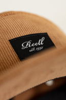 Reell 5-Panel Cap Cord, 100% cotton corduroy relaxed 5-panel snapback met structural brim stitching Reell woven logo patch op voorkant adjustable snapback closure met logo flag en woven brand label verkrijgbaar in Copper Brown Cord Hedge Cord en Black, verkrijgbaar bij Revert 95 Haarlem