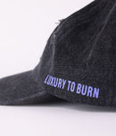 Former Ode Cap Washed Black – washed black 6-panel cap met subtiele Ode branding