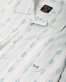 Dark Seas Breezy Short Sleeve Shirt in Moss, lichtgewicht cotton dobby woven shirt met relaxte camp collar button-up front en enkelvoudige borstzak, verkrijgbaar in Moss en Off White bij Revert 95 Haarlem