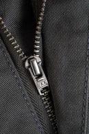 Reell Loose Flex Chino PC broek in Vulcan Grey, loose fit chino van dubbel geverfd polycotton met chino-details en subtiele Reell branding, verkrijgbaar bij Revert 95 Haarlem