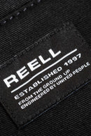 Reell Loose Flex Chino Short PC in Deep Black, loose fit knielengte short met chino-details, verkrijgbaar bij Revert 95 Haarlem