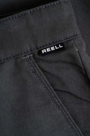 Reell Loose Flex Chino PC broek in Vulcan Grey, loose fit chino van dubbel geverfd polycotton met chino-details en subtiele Reell branding, verkrijgbaar bij Revert 95 Haarlem