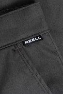 Reell Loose Flex Chino PC broek in Vulcan Grey, loose fit chino van dubbel geverfd polycotton met chino-details en subtiele Reell branding, verkrijgbaar bij Revert 95 Haarlem