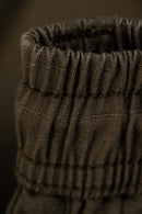 Reell Reflex Meadow broek in Flat White Ripstop, oversized chino-geïnspireerde broek van lichtgewicht ripstop met laag kruis en elastische tailleband, verkrijgbaar bij Revert 95 Haarlem