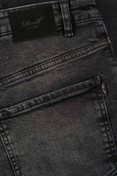 Reell Solid Black Wash 2 – zwarte stretch jeans met subtiele washed look en regular tapered fit