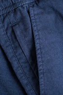Reell Reflex Easy Short in Superior Navy, 80% katoen 16% polyester 4% elastan Flex-stof short met elastische koordtaille opgestikte achterzakken en subtiele Reell branding in diepe marineblauwe kleur, verkrijgbaar bij Revert 95 Haarlem

