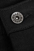 Reell Loose Flex Chino Short PC in Deep Black, loose fit knielengte short met chino-details, verkrijgbaar bij Revert 95 Haarlem