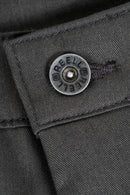 Reell Loose Flex Chino PC broek in Vulcan Grey, loose fit chino van dubbel geverfd polycotton met chino-details en subtiele Reell branding, verkrijgbaar bij Revert 95 Haarlem