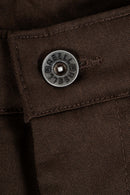 Reell Loose Flex Chino PC broek in Chocolate Brown, loose fit chino van dubbel geverfd polycotton met chino-details en subtiele Reell branding, verkrijgbaar bij Revert 95 Haarlem