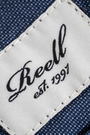 Reell Reflex Easy Short in Superior Navy, 80% katoen 16% polyester 4% elastan Flex-stof short met elastische koordtaille opgestikte achterzakken en subtiele Reell branding in diepe marineblauwe kleur, verkrijgbaar bij Revert 95 Haarlem
