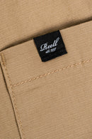 Reell Reflex Easy Cargo Short BR in Dark Sand, lichtgewicht Baby Ripstop cargo short met geritste zijzakken en welted zakken in warme beige zandkleur, verkrijgbaar bij Revert 95 Haarlem.
