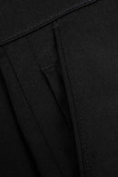 Reell Loose Flex Chino Short PC in Deep Black, loose fit knielengte short met chino-details, verkrijgbaar bij Revert 95 Haarlem