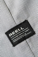 Reell Coach Jacket in Taupe, lichtgewicht waterafstotende nylon windbreaker in klassiek coach jacket silhouet met mesh voering en matte afwerking, verkrijgbaar bij Revert 95 Haarlem