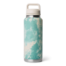 YETI Rambler 46 oz Bottle in Sea View Seafoam Pattern, 18/8 roestvrij staal double-wall vacuum insulated bottle met Chug Cap TripleHaul handle DuraCoat Sea View gemarmerd seafoam patroon No Sweat design vaatwasserbestendig BPA vrij 5 jaar garantie, verkrijgbaar bij Revert 95 Haarlem
