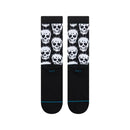 Stance Static Skull Crew Socks Black, crew sokken met all-over digitaal glitch-schedelpatroon en cyaanblauwe accentlijn, verkrijgbaar bij Revert 95 Haarlem