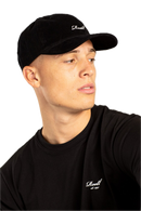 Reell Single Script Cap, 6-panel snapback met curved peak embroidered Reell script logo op voorkant embroidered ventilation eyelets en adjustable snapback closure verkrijgbaar in Black Cord Blue Grey Cord Blue Steel en Vintage Burgundy Cord, verkrijgbaar bij Revert 95 Haarlem