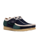 Clarks Originals Wallabee in Blue/Green Stripe met gestreept suède bovenwerk, handgenaaide apron seam en natuurlijke pebble crêpezool, verkrijgbaar bij Revert 95 Haarlem