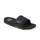 Reef Fanning Slide heren slipper in Black/Silver met verstelbare waterbestendige strap, compression molded EVA voetbed met airbag en ingebouwde flesopener, verkrijgbaar bij Revert 95 Haarlem