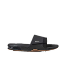 Reef Fanning Slide heren slipper in Black/Silver met verstelbare waterbestendige strap, compression molded EVA voetbed met airbag en ingebouwde flesopener, verkrijgbaar bij Revert 95 Haarlem