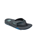 Reef Fanning heren slipper in Gunmetal/Ocean met synthetische nubuck upper, EVA voetbed met hiel airbag en ingebouwde flesopener in de rubberen zool, verkrijgbaar bij Revert 95 Haarlem