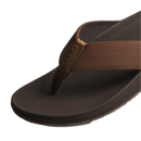 Reef The Raglan heren slipper in Java/Gum met overlasted waterbestendige strap en deep contour suikerriet EVA voetbed, verkrijgbaar bij Revert 95 Haarlem