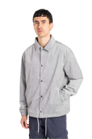 Reell Coach Jacket in Taupe, lichtgewicht waterafstotende nylon windbreaker in klassiek coach jacket silhouet met mesh voering en matte afwerking, verkrijgbaar bij Revert 95 Haarlem