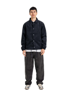Reell Baggy corduroy broek in Vulcan Grey Cord, ruime baggy fit met zachte ribstructuur en klassiek 5-pocket design in gedempte grijze kleur, beenopening 45cm, verkrijgbaar bij Revert 95 Haarlem
