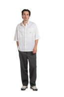 Reell Loose Flex Chino PC broek in Vulcan Grey, loose fit chino van dubbel geverfd polycotton met chino-details en subtiele Reell branding, verkrijgbaar bij Revert 95 Haarlem