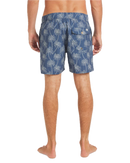 RVCA Exotica Elastic 2 Swim Short 16 inch in Dark Denim, 4-way stretch cocotex fabric 53% recycled polyester 32% polyester 9% elastane 6% cotton wrinkle-resistant quick dry short met faux fly side seam pockets back patch pockets triple-needle stitching en art label in diepe indigo Dark Denim colorway, verkrijgbaar bij Revert 95 Haarlem