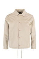 Reell Coach Jacket in Taupe, lichtgewicht waterafstotende nylon windbreaker in klassiek coach jacket silhouet met mesh voering en matte afwerking, verkrijgbaar bij Revert 95 Haarlem