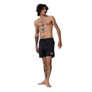 Santa Cruz Salba Voodoo Pit Swimshorts in Black, 100% nylon polymesh lined zwemshort met elasticated waistband 17 inch outseam side pockets back welt pocket en all over Aqua React print die zichtbaar wordt bij nat pro model Steve Salba Alba, verkrijgbaar bij Revert 95 Haarlem