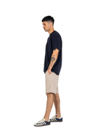 Reell Reflex Easy Short in beige Textured, relaxed fit short met subtiele textuurstructuur en elastische tailleband, verkrijgbaar bij Revert 95 Haarlem