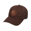 RVCA Sanctum Dad Cap Chocolate Brown, 5-panel cotton twill cap met gebogen klep en centrale embroidery, one size, verkrijgbaar bij Revert 95 Haarlem