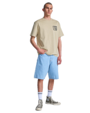 RVCA Face to Face Tee in Khaki, relaxed fit katoenen T-shirt met bold graphic van spiegelende gezichten op de rug en klein borstdetail, verkrijgbaar bij Revert 95 Haarlem