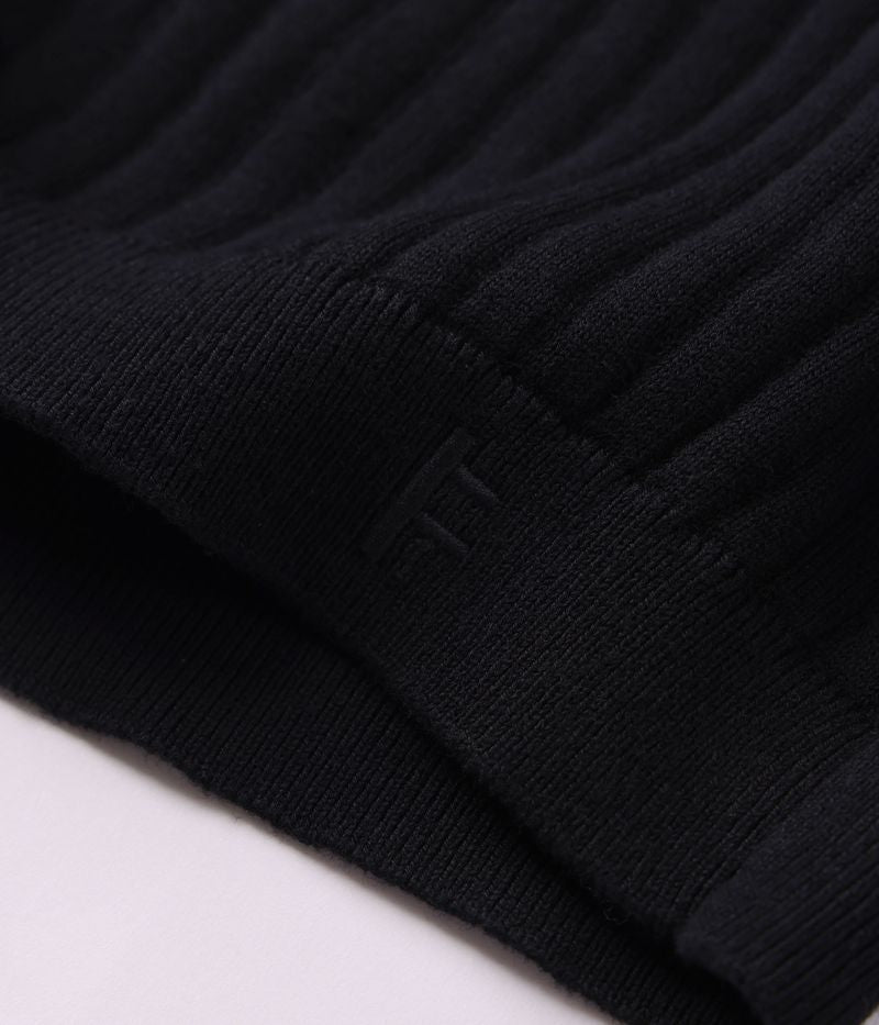 Former Franchise LS Knit Polo Black – premium knit longsleeve polo met minimalistische branding