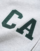 Cash Only Campus Applique Zip-Thru Hood Ash, heavyweight fleece hoodie van 70% cotton 30% polyester 13oz met felt applique op de borst en split panel hood, maten S-3XL, verkrijgbaar bij Revert 95 Haarlem